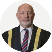 Andrew Moran, H.E. Justice